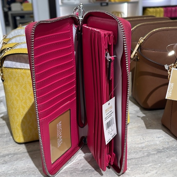 MICHAEL KORS Continental Wristlet Phone Case Wallet 
Dragonfruit 
NWT - Picture 9 of 16